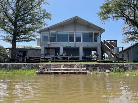 The lake is full and steps from the back deck.