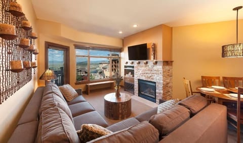 Kick back your feet and relax in the spacious, bright living room.