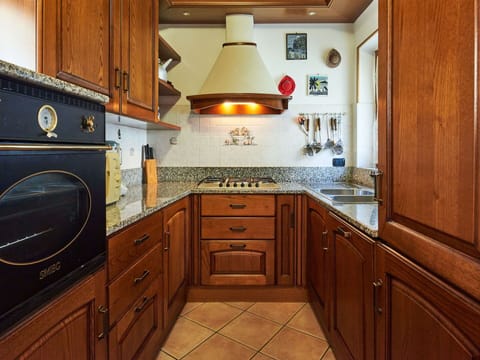 Table, Sky, Furniture, Tableware, Building, Interior Design, Outdoor Furniture, Porch, Shade, Chair