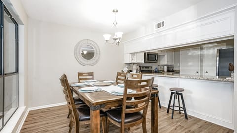 Full size dining table with option to extend it plus 3 barstools 