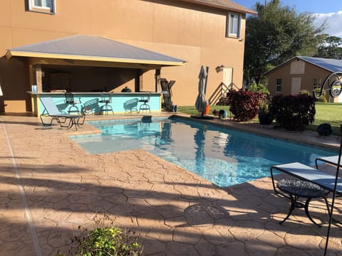 Pool view with bar and grill.