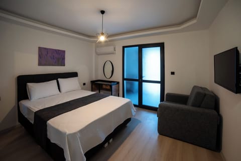 Junior Suite, Balcony, Sea View | Minibar, desk, free WiFi, bed sheets