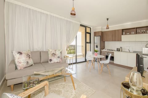 Deluxe Apartment | Living area | 42-inch flat-screen TV with cable channels, TV, Netflix