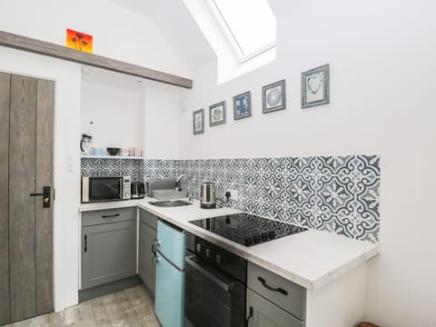 Fridge, electric kettle, toaster, cookware/dishes/utensils