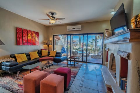 An open living area with large to be in plenty of seating for guest,