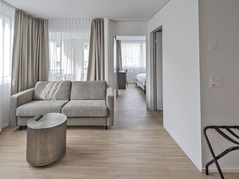 Superior Apartment | Living area | 43-cm flat-screen TV with digital channels, offices