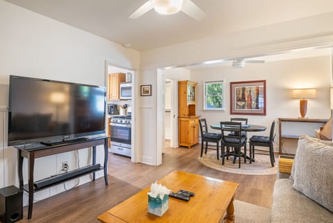 The lounge, dining nook, and kitchen flow together in one open space