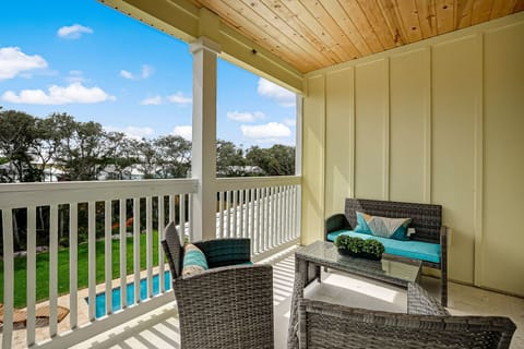 Feel the breeze through your hair on this second story balcony. 