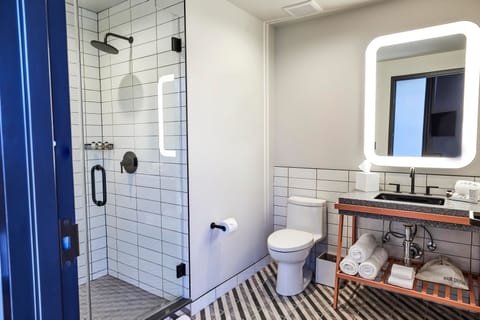 Shower, rainfall showerhead, designer toiletries, hair dryer