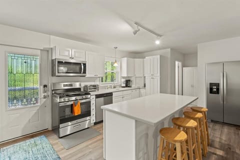 Full kitchen-stove, microwave, dishwasher, refrigerator