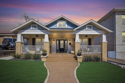 This charming home with a spacious front porch is a 2-minute walk to Dickies Arena. 