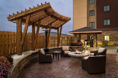 Gather around the cozy fire pit and enjoy the warmth of good company and cool evening breezes.
