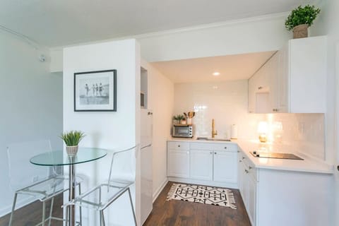 Kitchen stocked with a drip coffee maker.