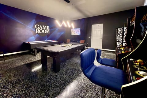 Newly Added Garage Game Room Features Air Hockey, Pool Table and Video Arcade Games!