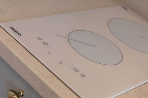 Close-up of a modern cooktop.