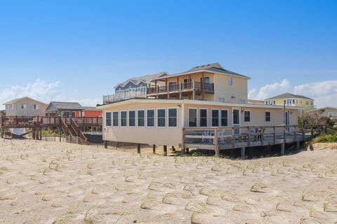 Looking at the home from the beach access