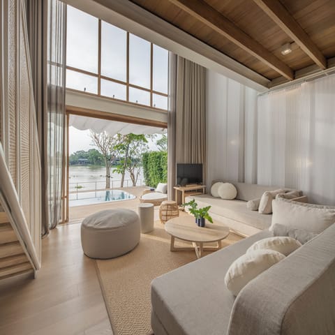 River View Pool Villa Suite | Living area | 43-inch Smart TV with cable channels, TV