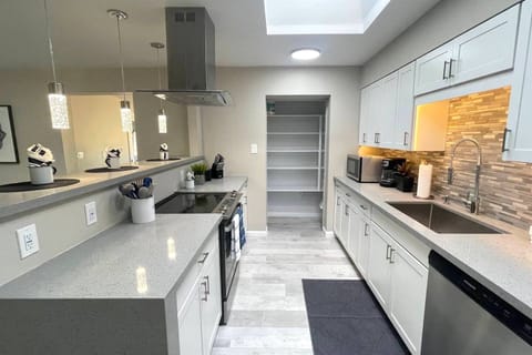 A spacious kitchen to cook a family dinner together.
