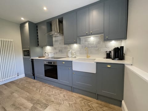 You can also find a Nespresso machine and a wine fridge