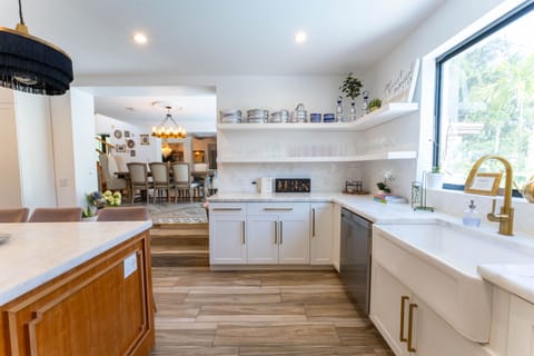 Dining connection flows into dining area with open shelves