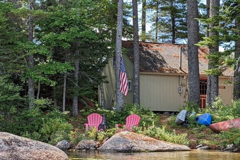 Small Maine beach, Kayaks and Canoes for your use.