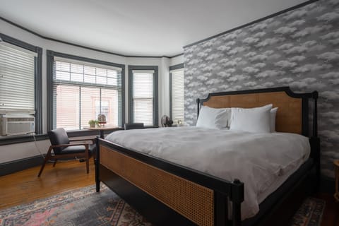 IDA LEWIS | Premium bedding, memory foam beds, minibar, in-room safe