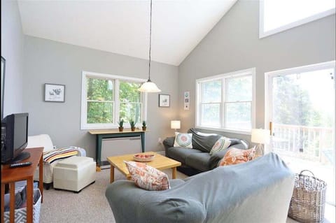 Living Room with Mountain Views at Waterville Estates Home