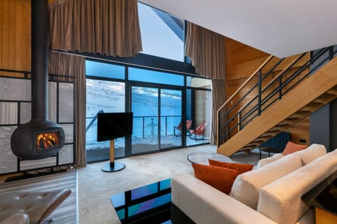 Executive Chalet | Living area | Fireplace