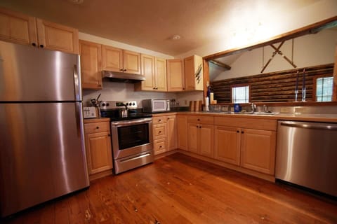 The kitchen has refreshed appliances and all the cooking tools you'd need to make a meal for friends and family.