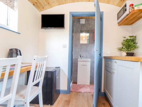 Fridge, electric kettle, toaster, cookware/dishes/utensils