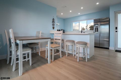 Dining Area has a lovely table for 4 and Breakfast Bar for an additional 4