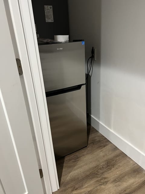 Small fridge in entertainment area