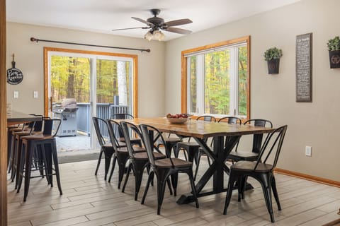 Dining room table with space for 10 and 4 bar stools as well. 
