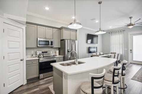 Kitchen with island and stainless appliances