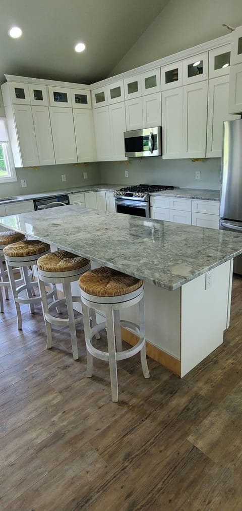 Kitchen has island seating
