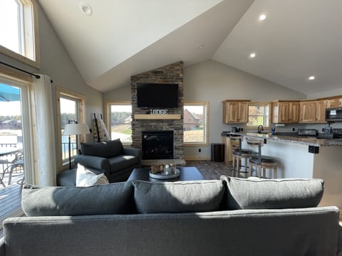 Gorgeous STONE fireplace! (Turned on with a flip of a switch!)