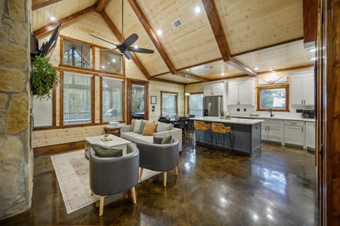 Cozing living room and fully stocked kitchen.