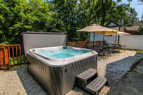 Private outdoor hot tub open year-round. Unwind under the trees after a day in Ephraim