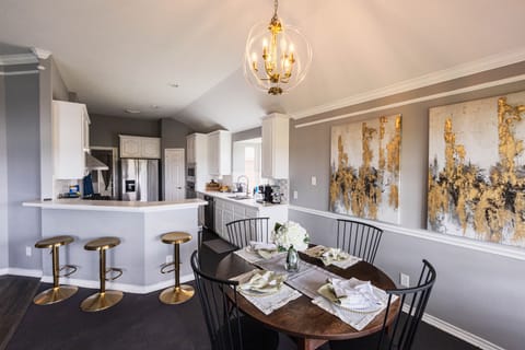 Enjoy meals in our cozy dining space with comfortable seating.