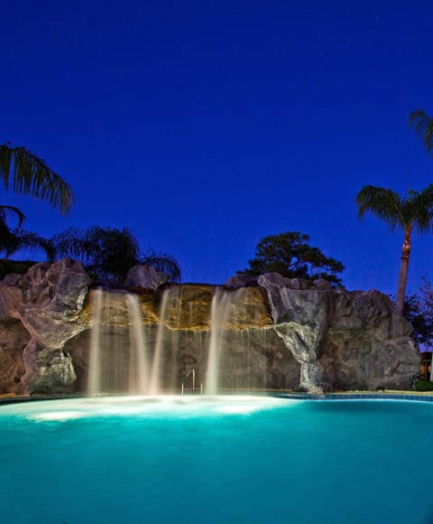 Outdoor pool, open 8:00 AM to 10:00 PM, pool umbrellas, sun loungers