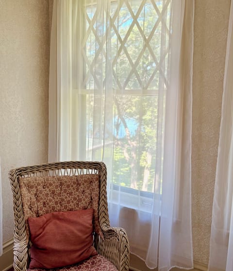 Mary Room's chair located in attached porch, second floor