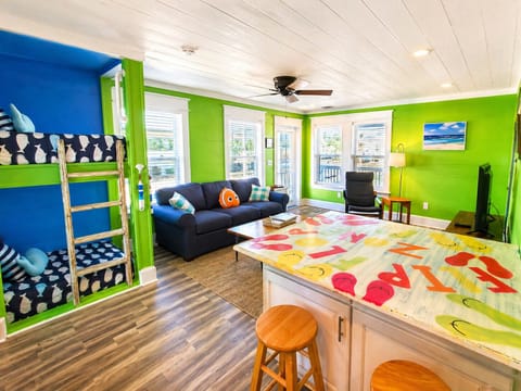 Living Room with stools around island