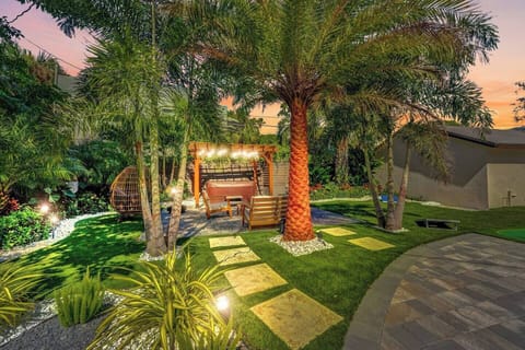Palm trees providing shade and a tropical vibe to our garden oasis!