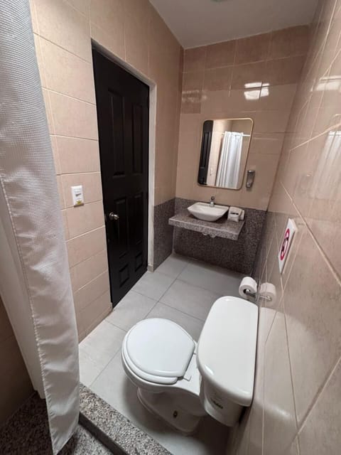 Shower, towels, soap, shampoo