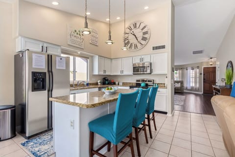 Kitchen is well stocked and includes ample counterspace for food preps.
