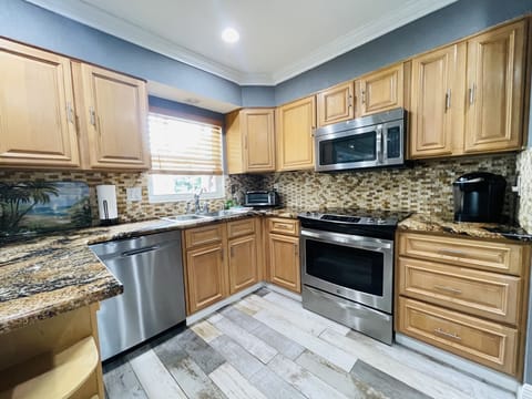 Kitchen - dishwasher, icemaker and everything you need to cook.