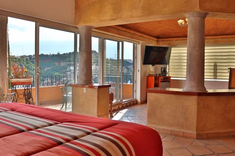 Deluxe Studio Suite (Cadbury) | Bathroom | Shower, hair dryer, slippers, towels