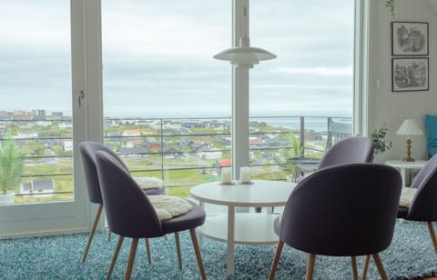Standard Apartment | Living area | 40-inch flat-screen TV with satellite channels