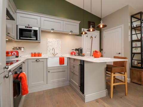 Fridge, electric kettle, toaster, cookware/dishes/utensils