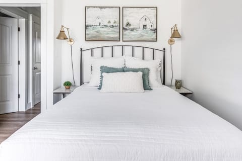 Adorable guest room with a queen bed. 